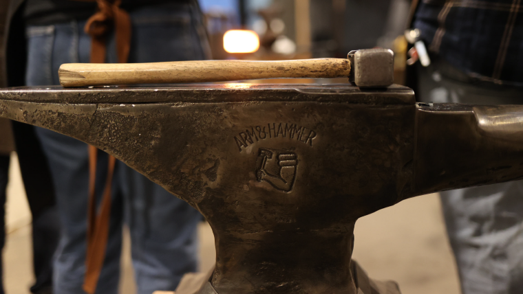 Hammer on in anvil in a blacksmith course